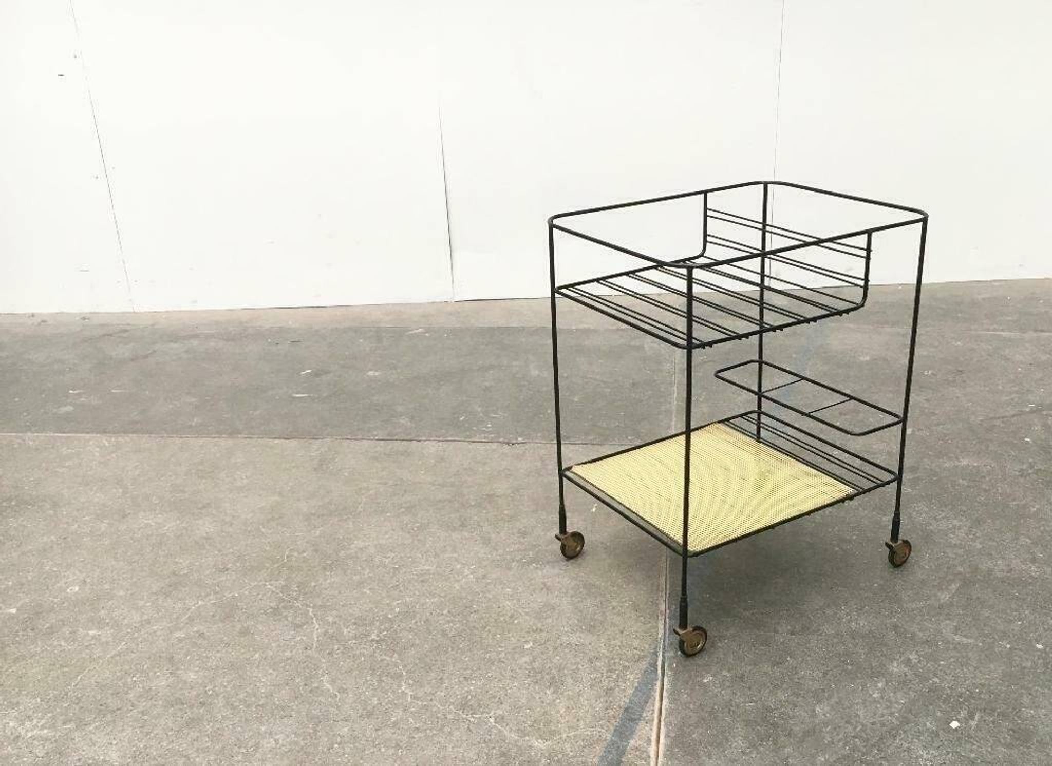 Minimalist perforated metal serving trolley in mid-century style, 1960s.