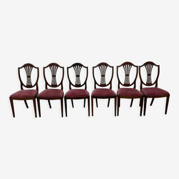 Set of 6 wooden chairs sitting red