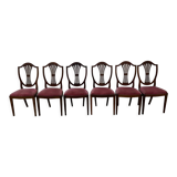 Set of 6 wooden chairs sitting red