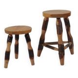Pair of walnut stools sculpted in a vintage mid-century cross-section.