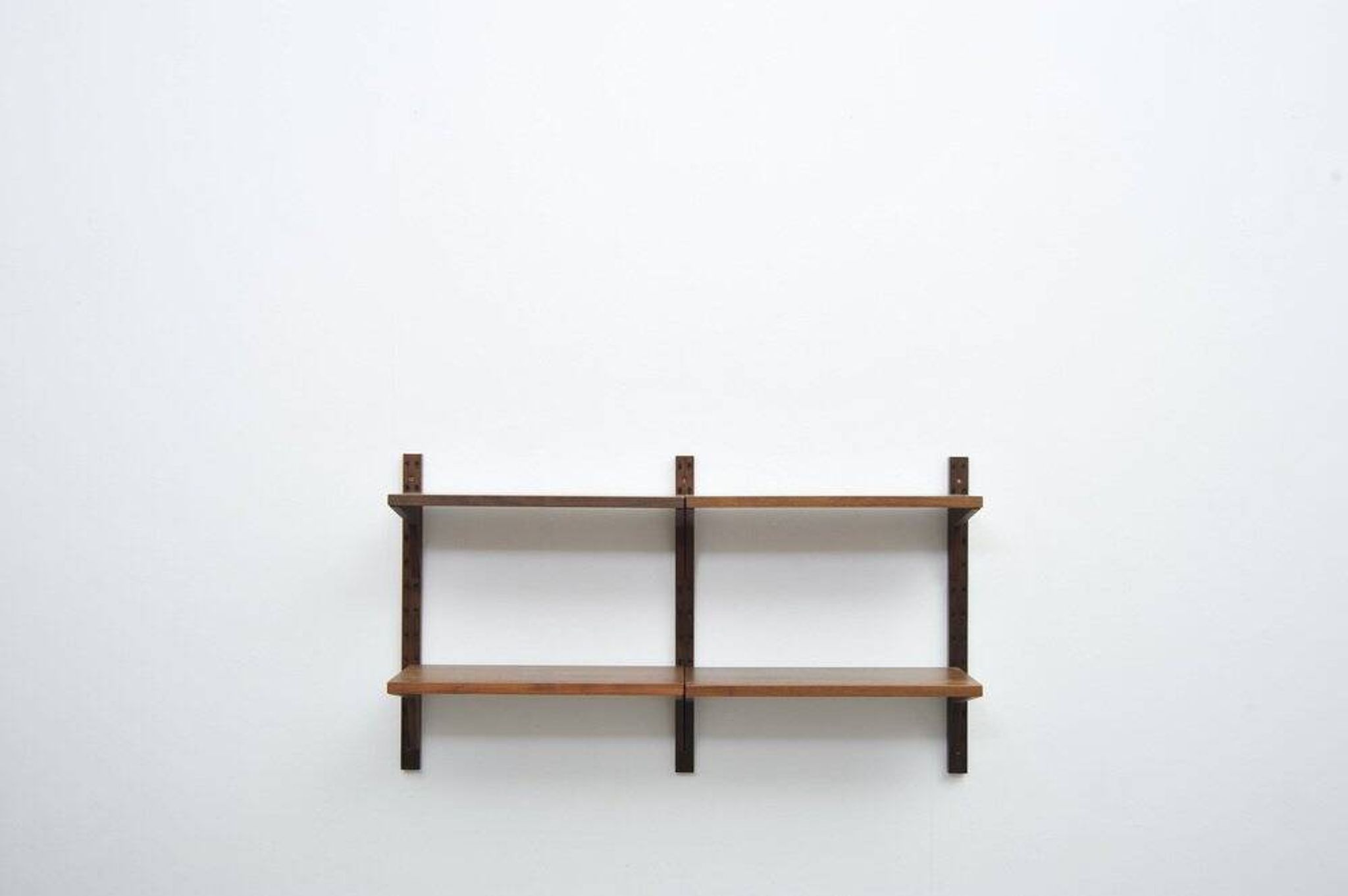 Vintage Royal System shelf in walnut by Poul Cadovius, 1950