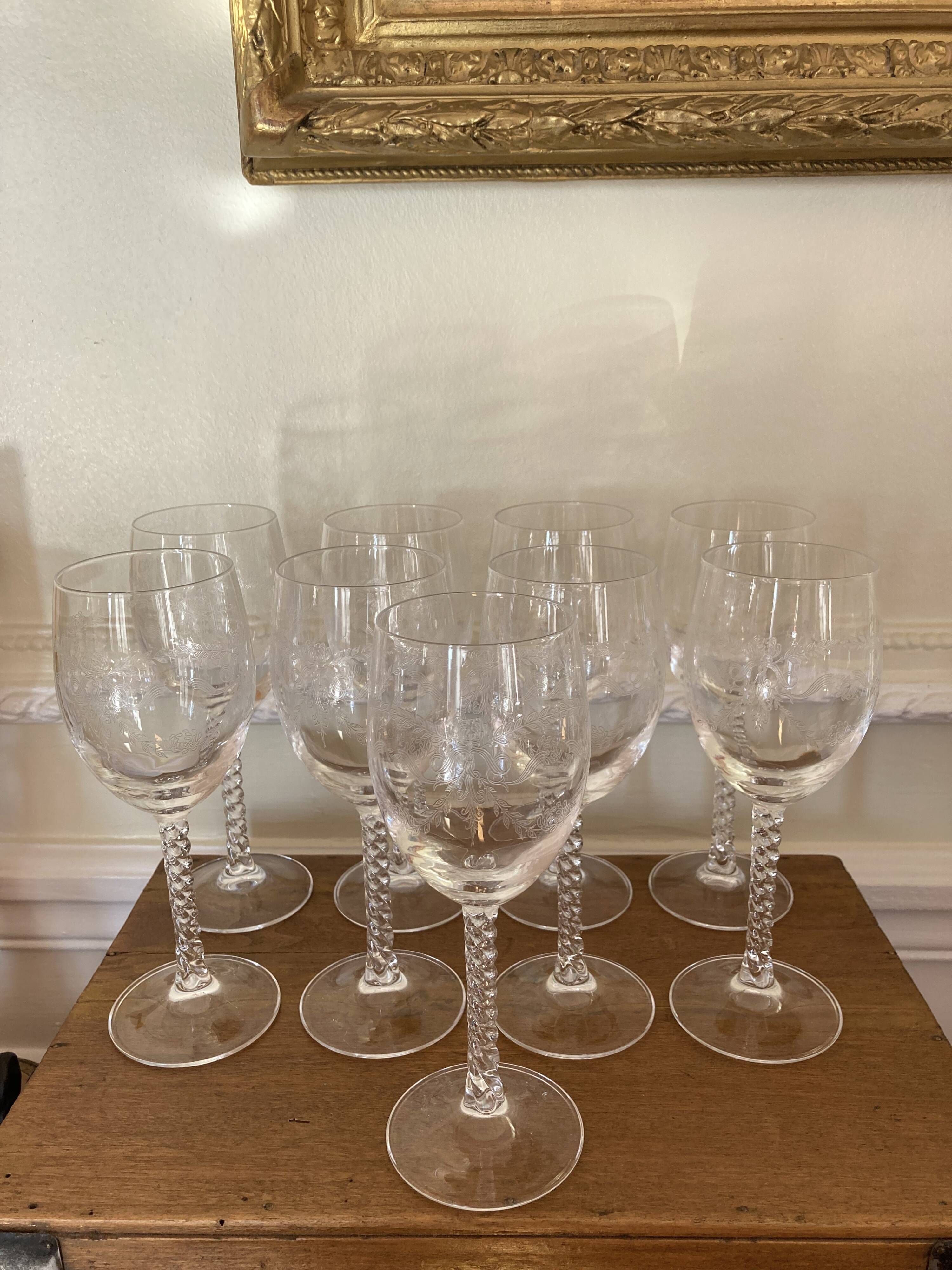 Set of 9 tall twisted and engraved crystal wine glasses
