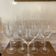 Set of 9 tall twisted and engraved crystal wine glasses