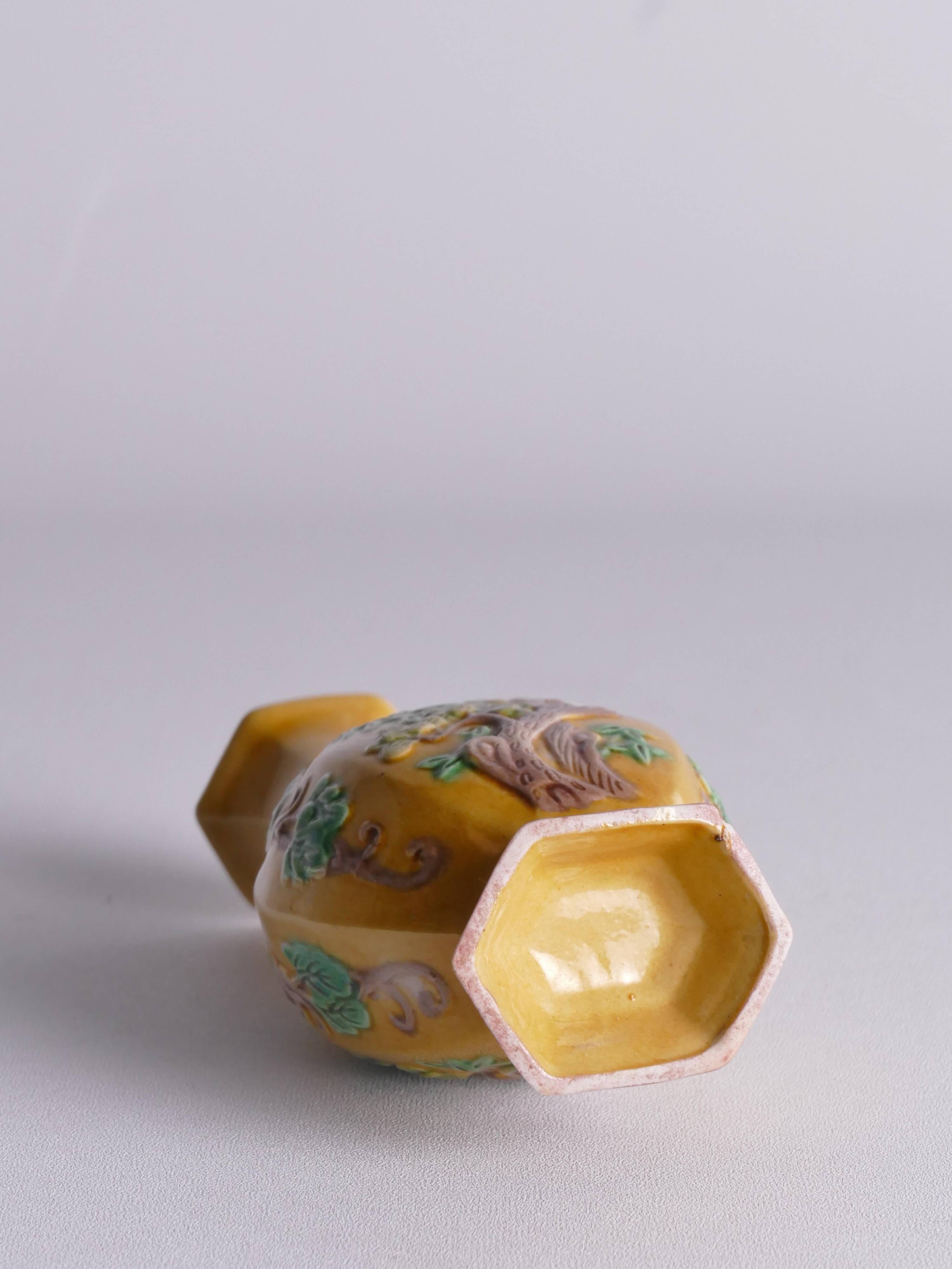 Chinese Yellow Glazed Hexagonal Relief Porcelain Vase with Prunus Motif