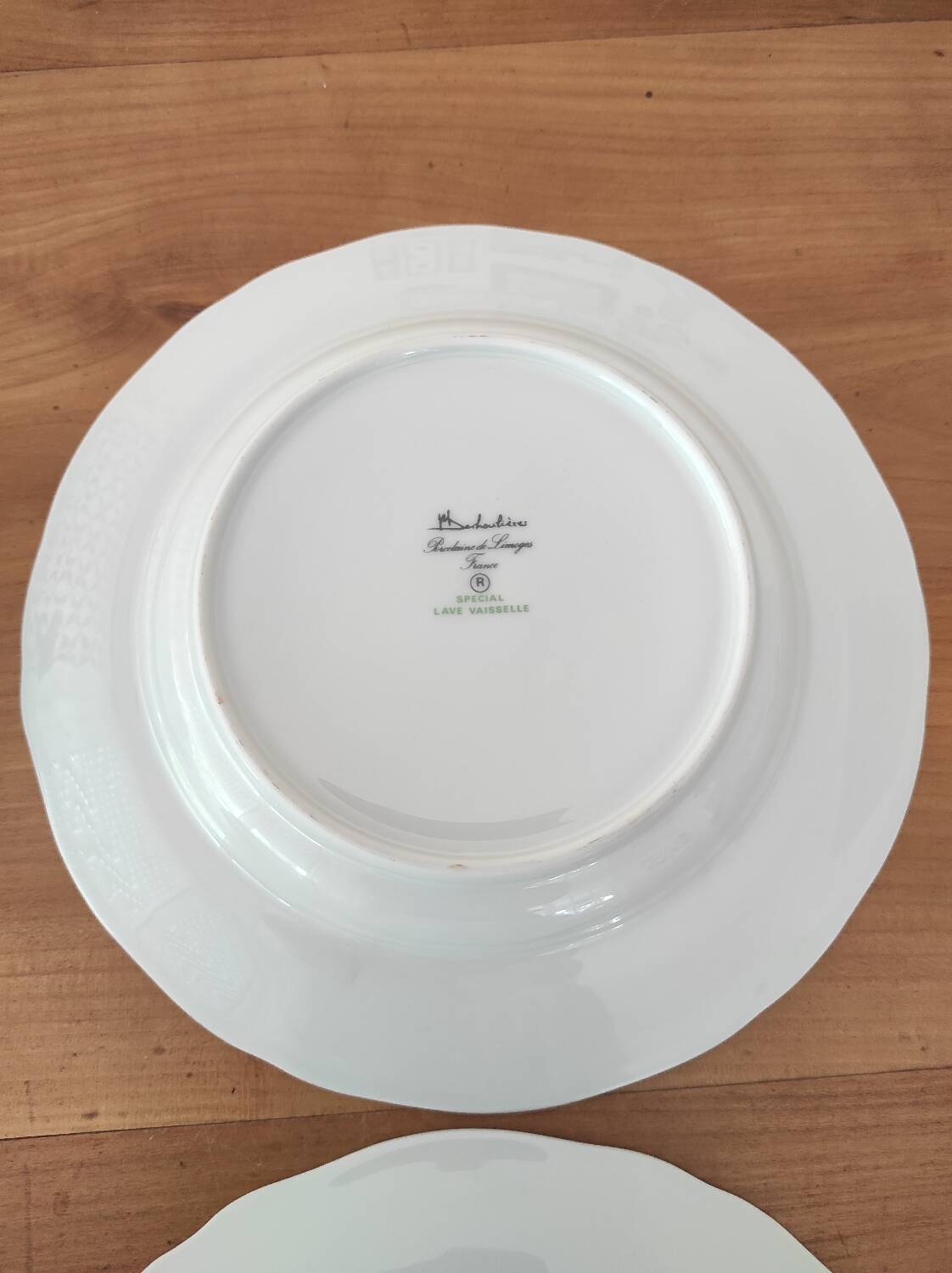 Set of 4 Limoges porcelain soup plates