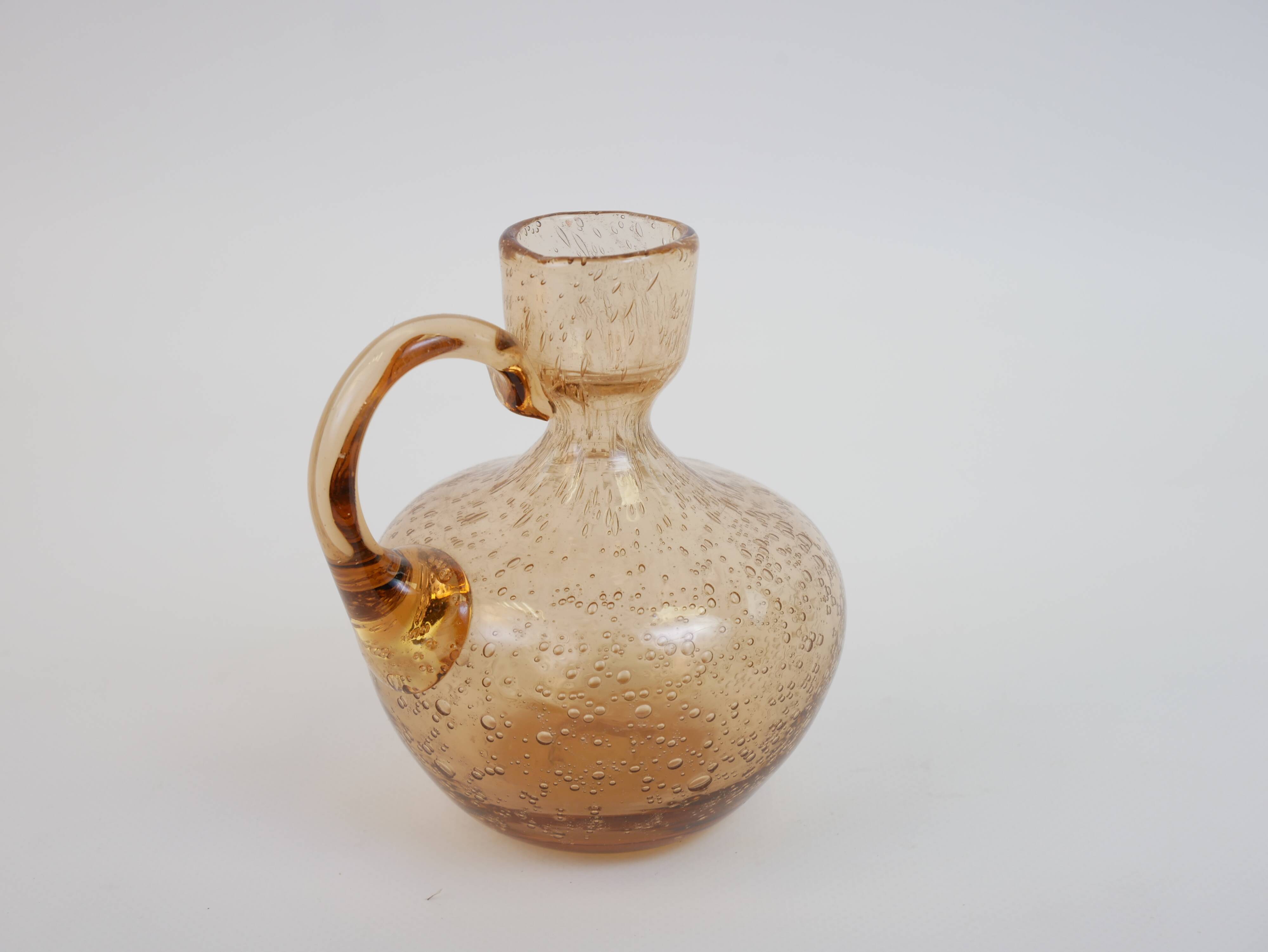 Petit porte bougie en verre bullé rose de Biot