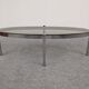 Oval smoked glass coffee table from the 60s/70s