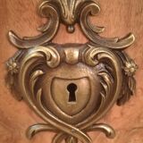 Curved chest of drawers in elm magnifying glass and bronze