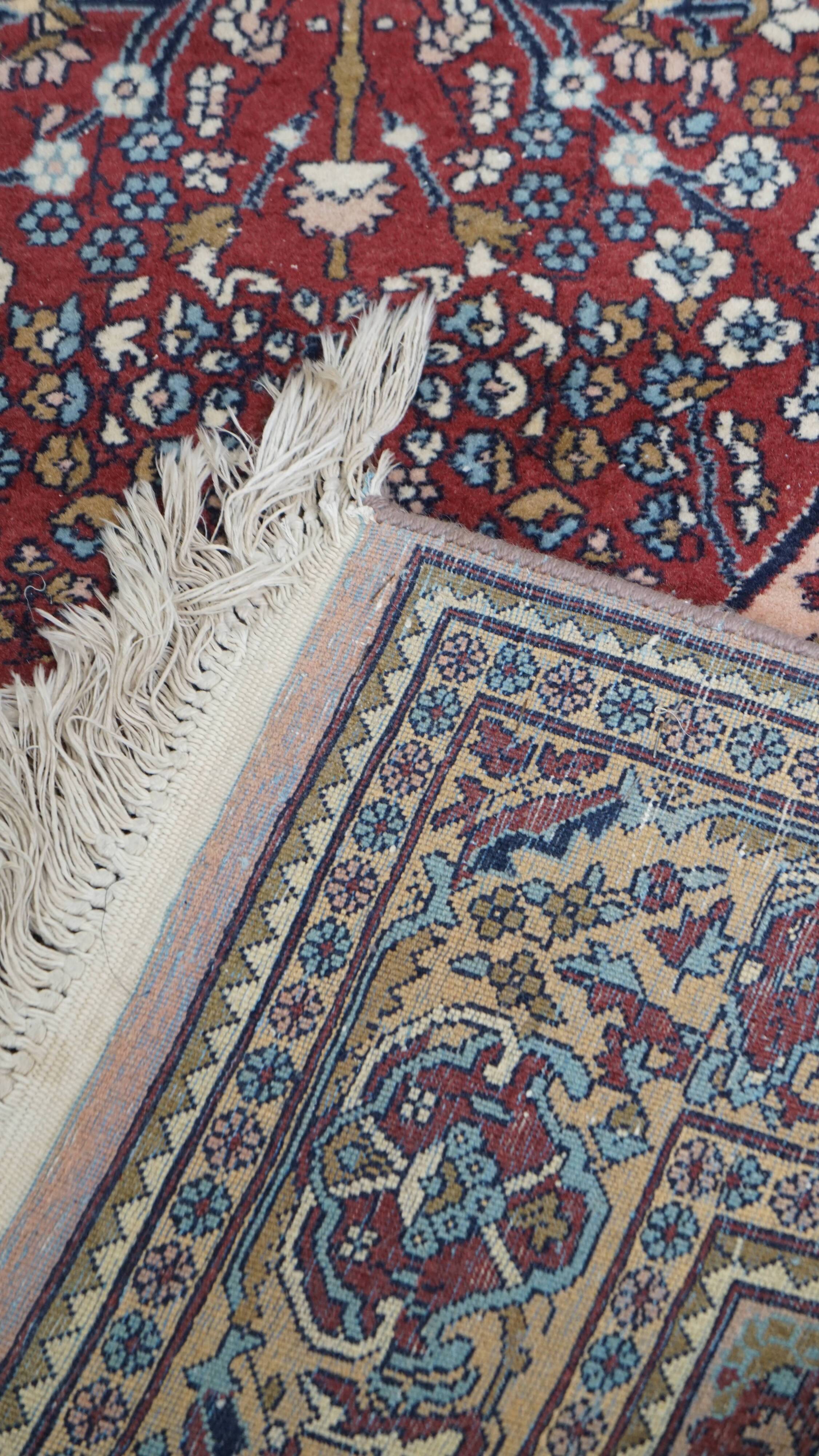 Hand-knotted rug with patterns – 232x139cm