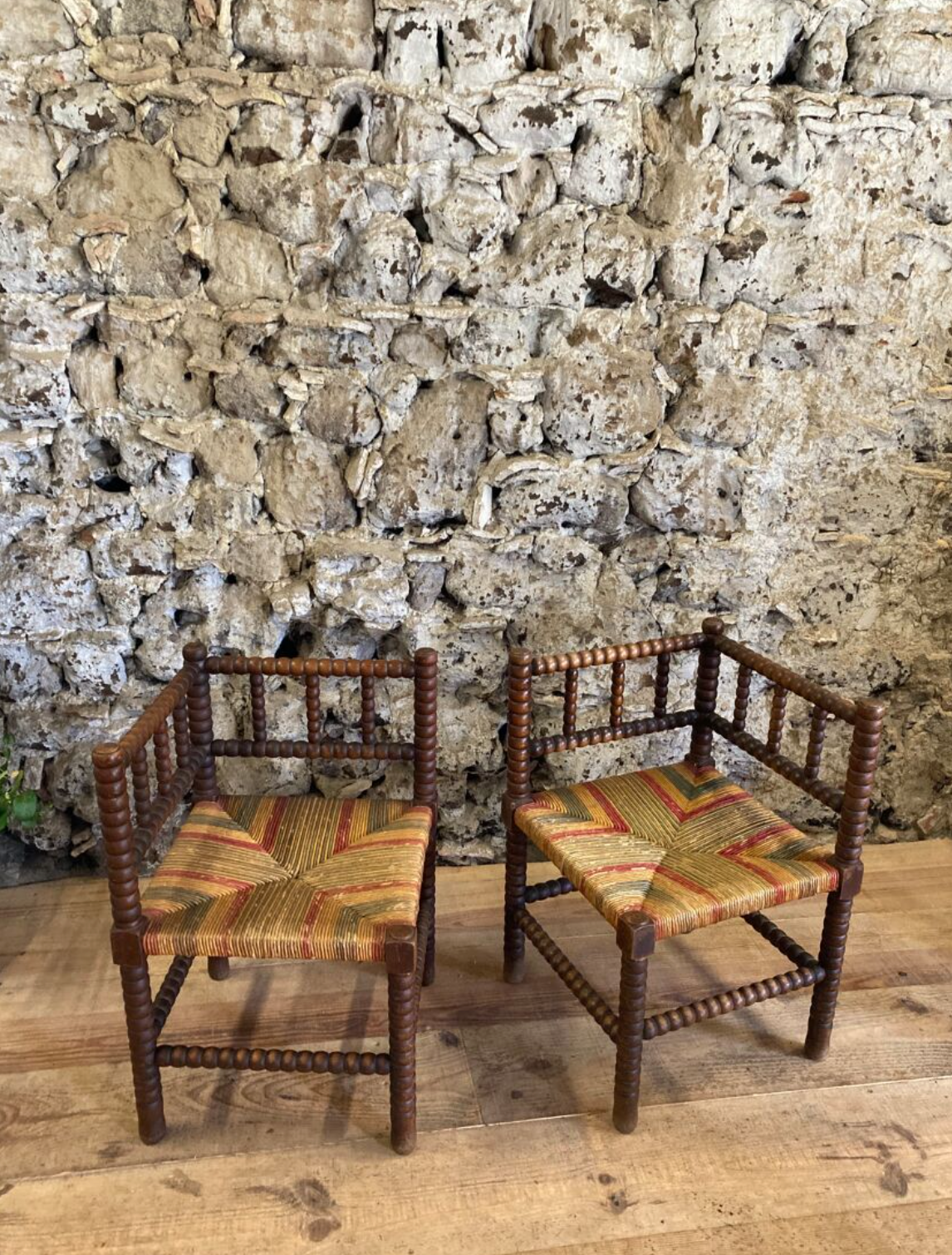 Pair of corner armchairs paillés in turned wood antique multicolored seat