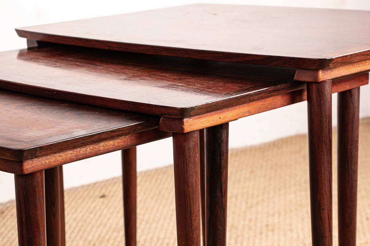 Three Danish nesting tables in rosewood by Mobelintersia 1960.