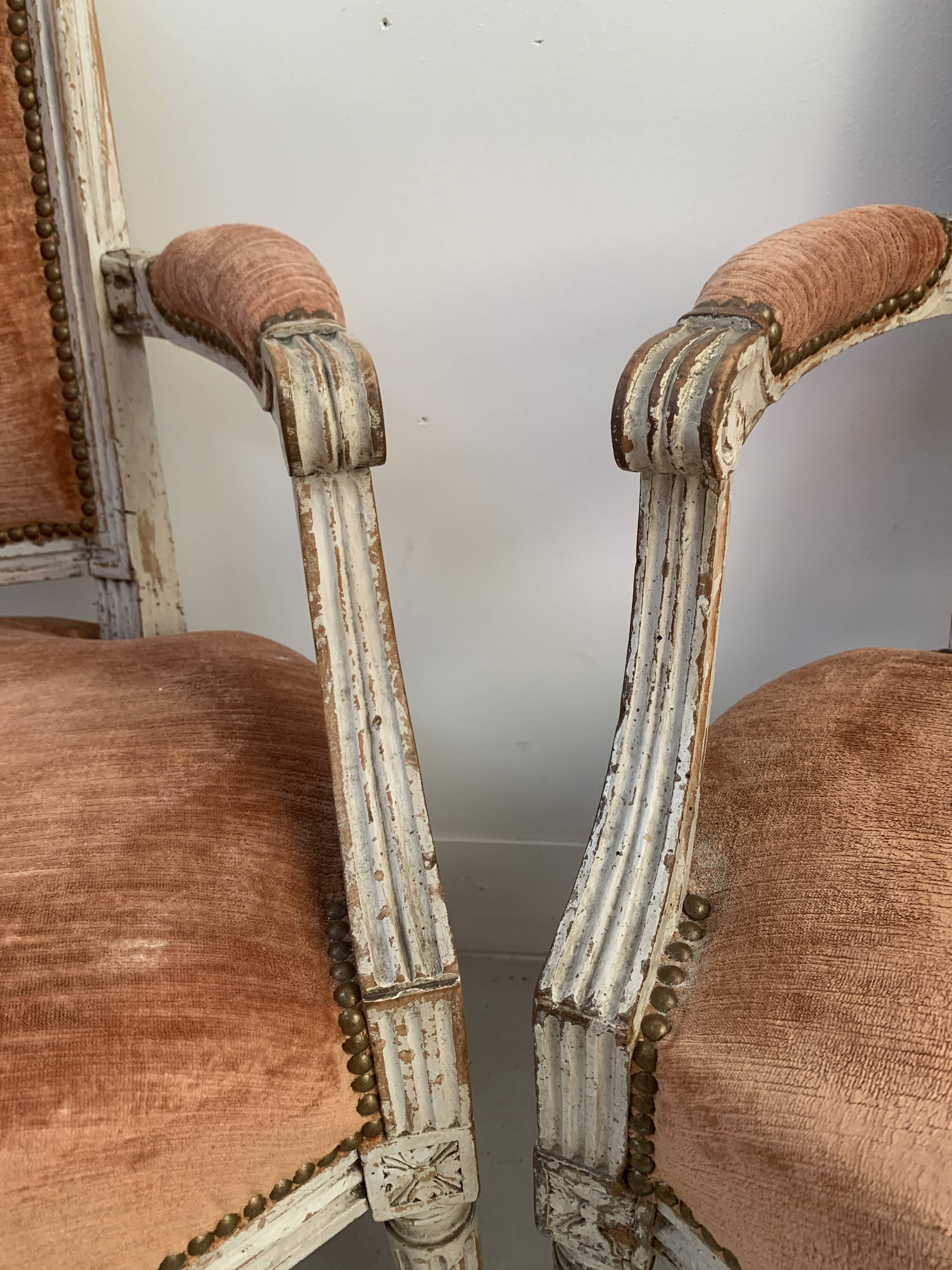 Pair of Louis XVI style armchairs in patinated beech, 19th century