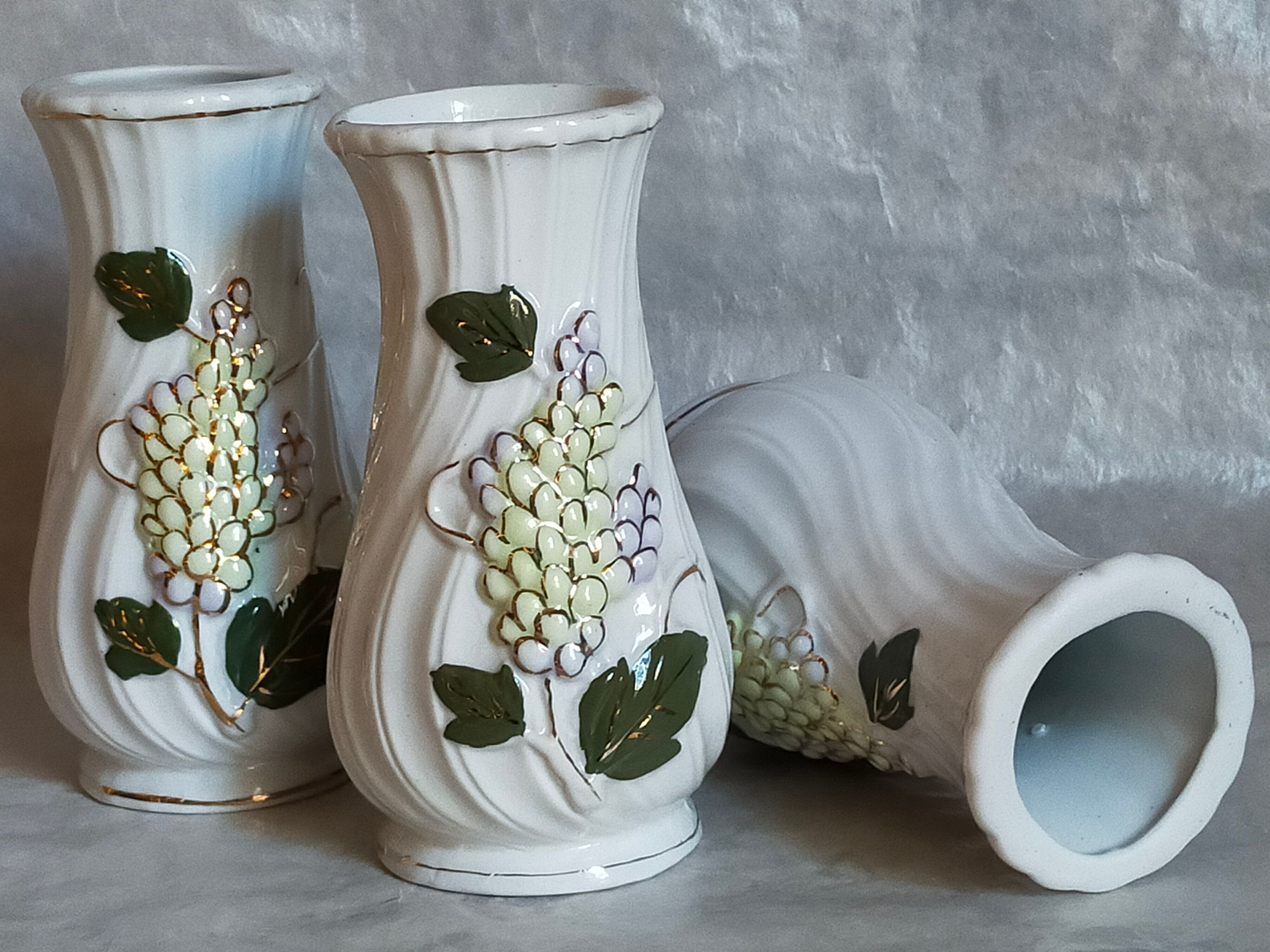 Three ancient lilac slurry vases