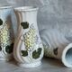 Three ancient lilac slurry vases