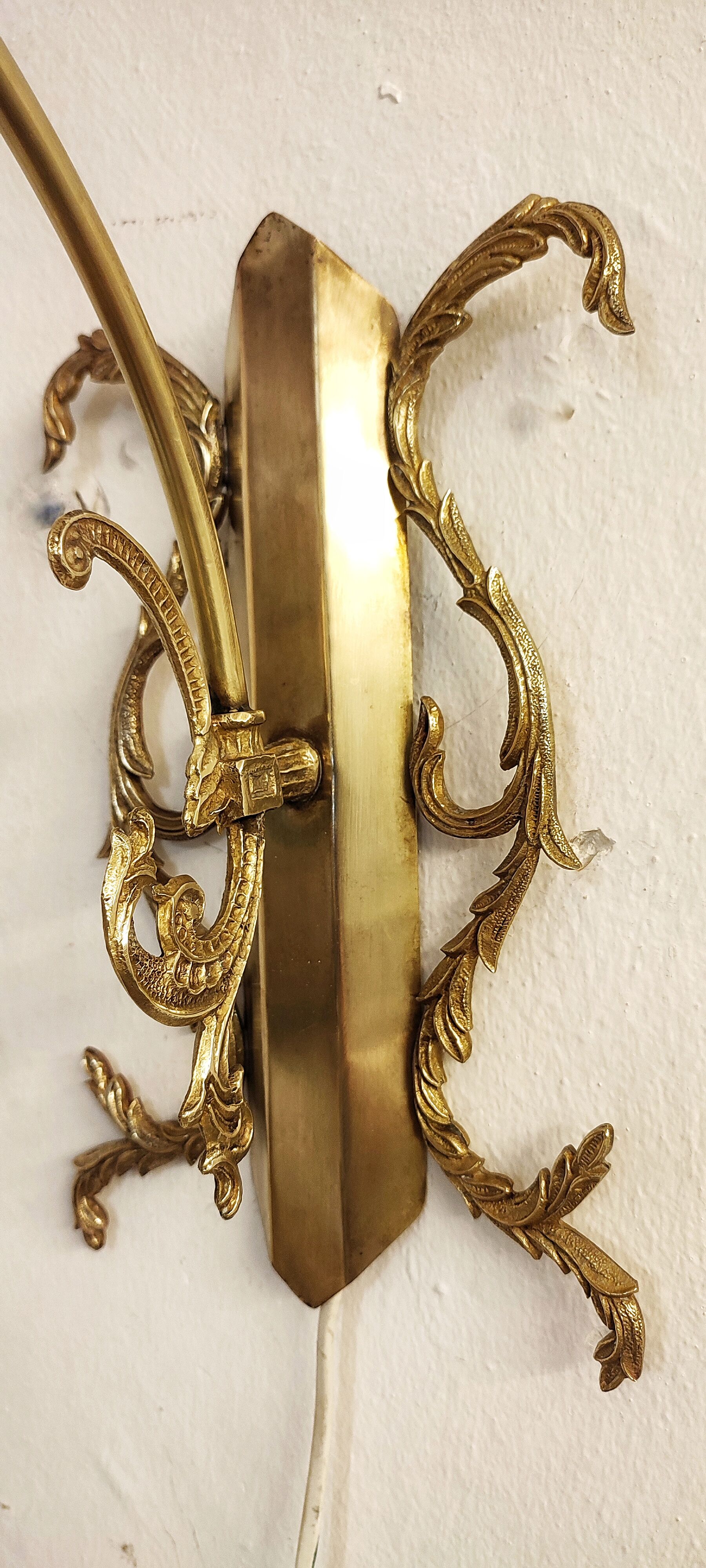 Bronze Modernist wall lamp. Spain, 1930s.