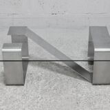 Coffee table with "kinetic" steel base and glass slab. Circa 1970.