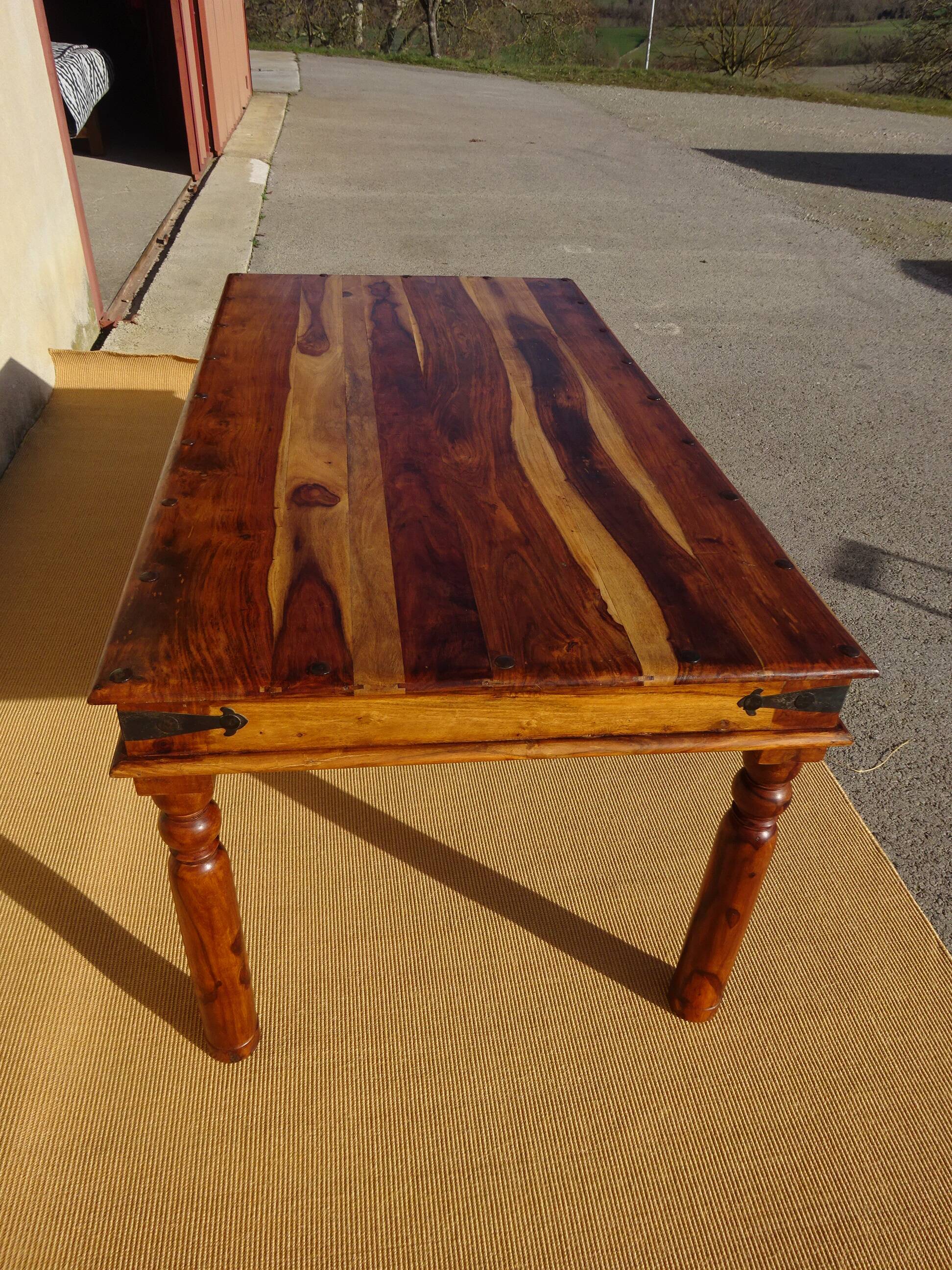 Solid wood and wrought iron table