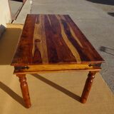 Solid wood and wrought iron table