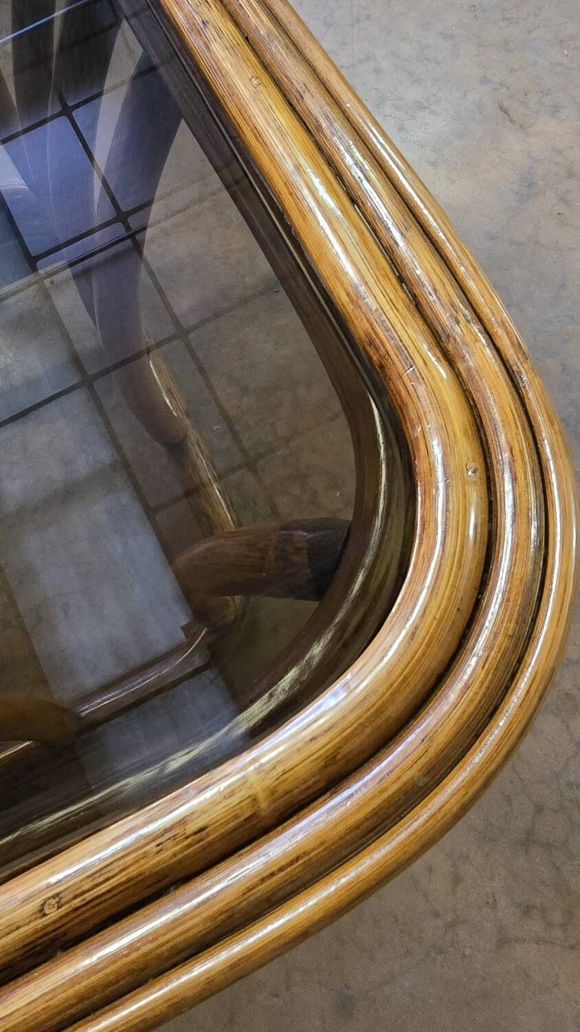 Rattan and smoked glass coffee table, vintage 1970s design.