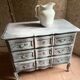 Antique Louis XV style commode, aged finish, practical elegance.