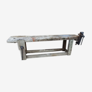 Wooden carpenter's workbench with iron and wooden vice