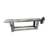 Wooden carpenter's workbench with iron and wooden vice