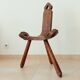 Chaise brutaliste tripode début XXeme