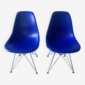 Set of two Vitra plastic chairs by Charles and Ray Eames