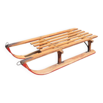 Antique wooden sled with metal runners