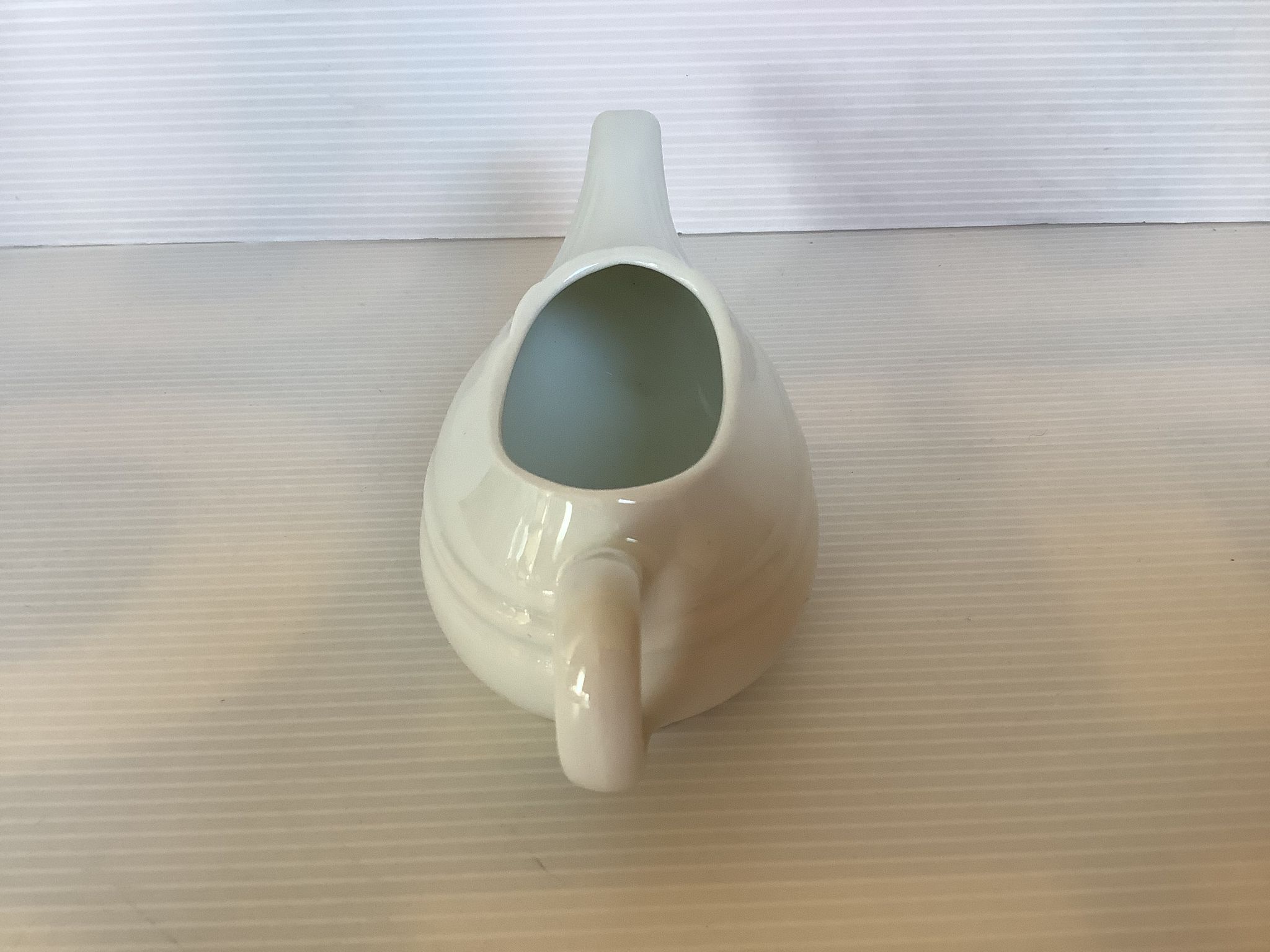 White porcelain sauceboat antique baby bottle