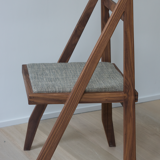 Walnut chair designed by Martin Gillis Studio