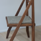 Walnut chair designed by Martin Gillis Studio