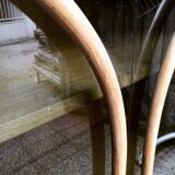 Curved bamboo and blond rattan library