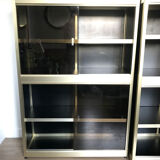 Shelves of black and gold windows