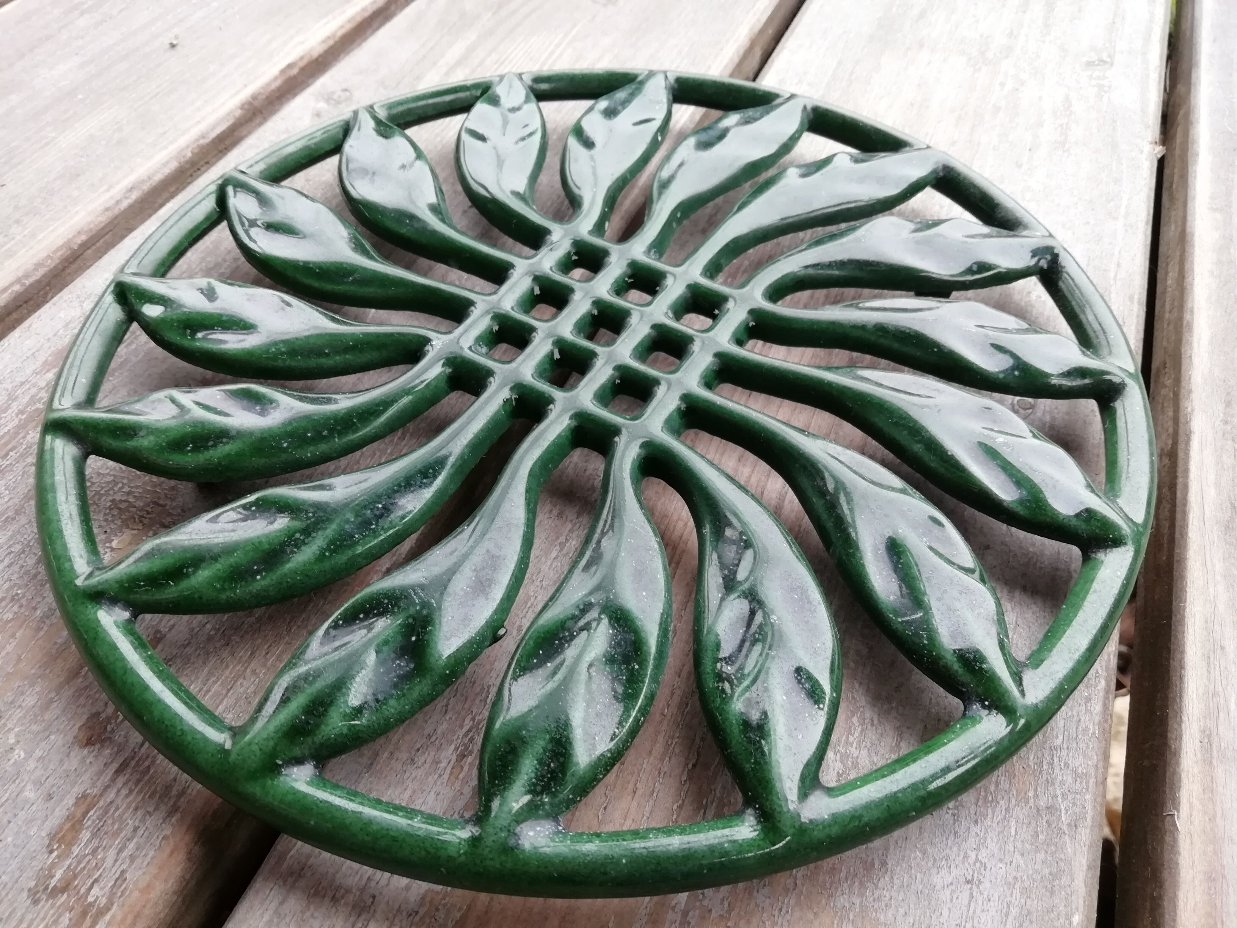 Pair of cast iron table mats