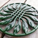 Paire de dessous de plat en fonte