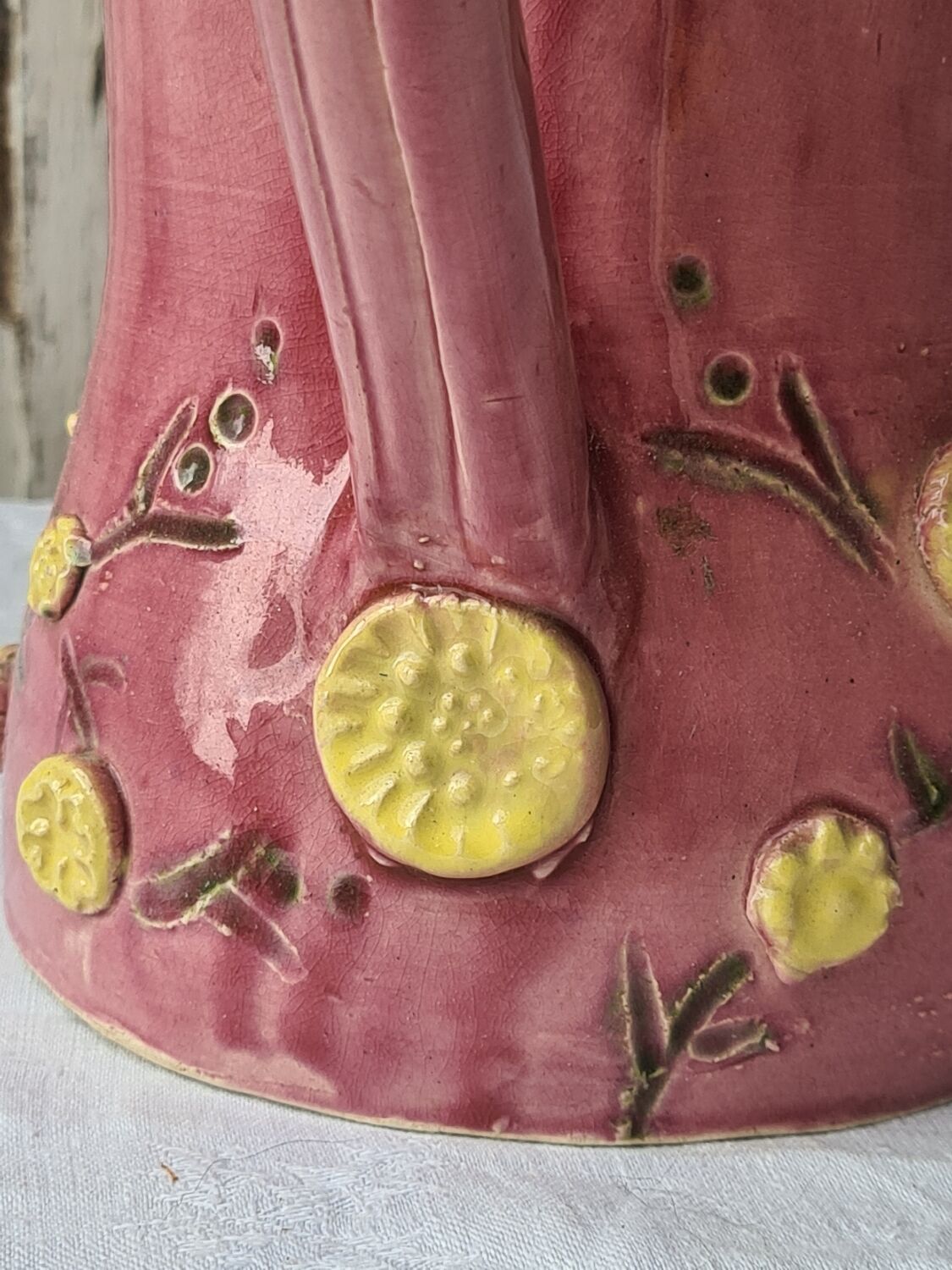 Glazed terracotta pitcher with mimosa decoration