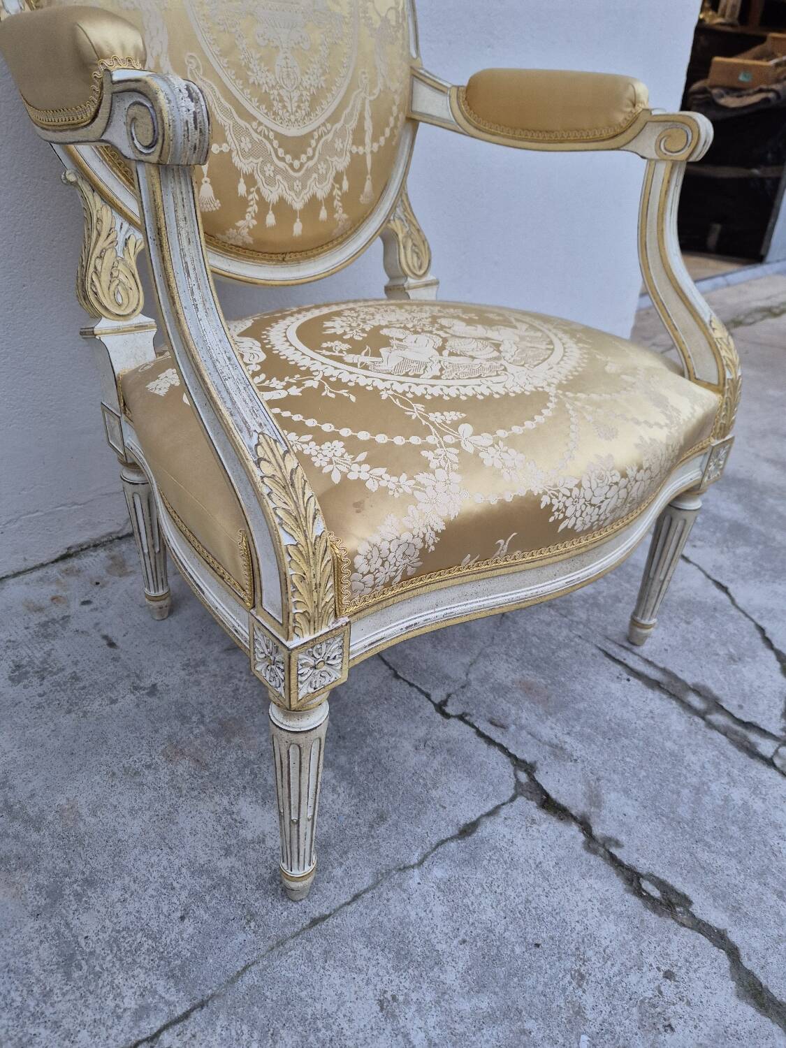 Louis XVI style cabriolet armchair with decorated medallion