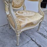 Louis XVI style cabriolet armchair with decorated medallion