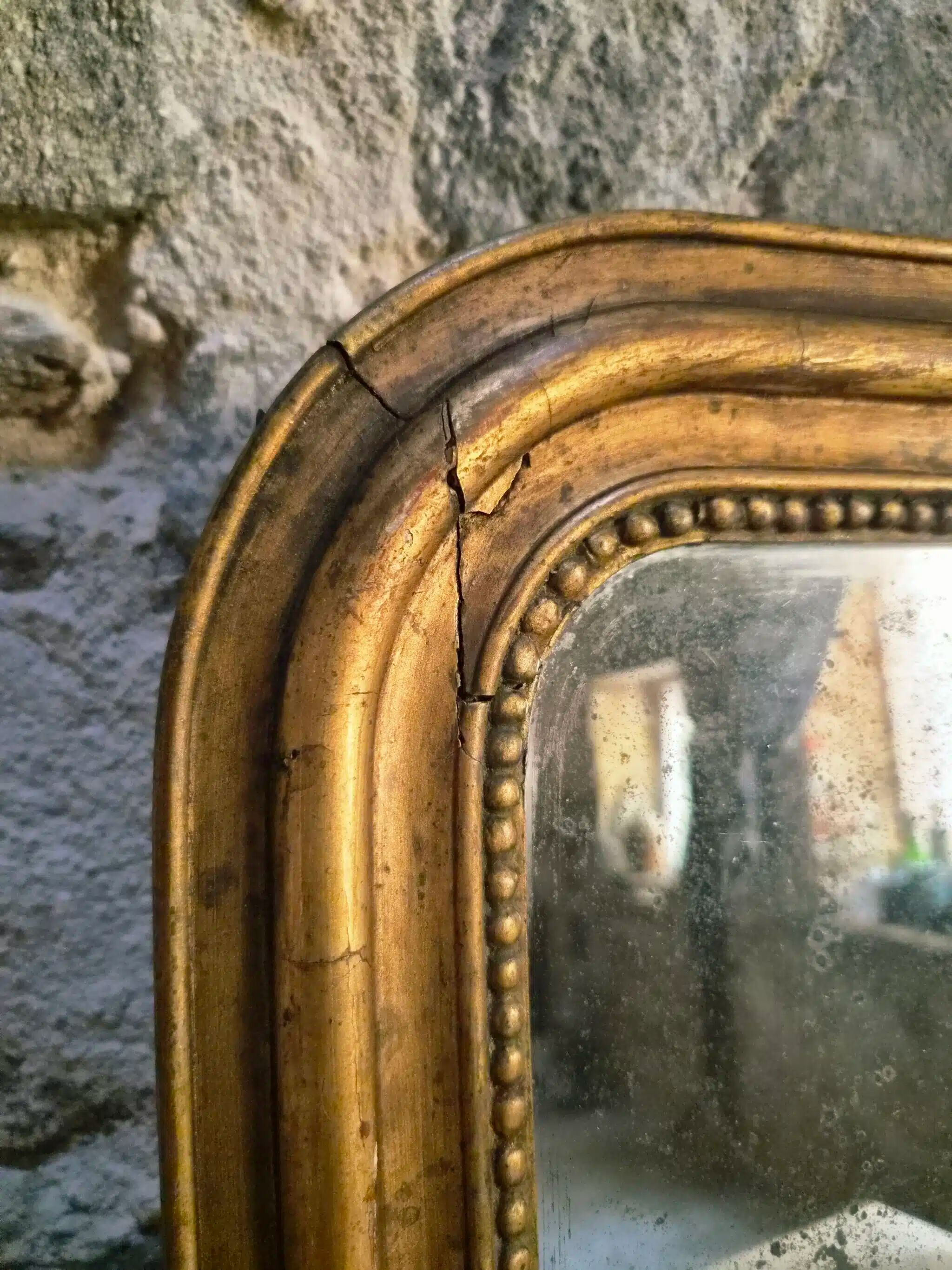 Antique French Louis Philippe mirror, gilded mercury mirror, 19th century.