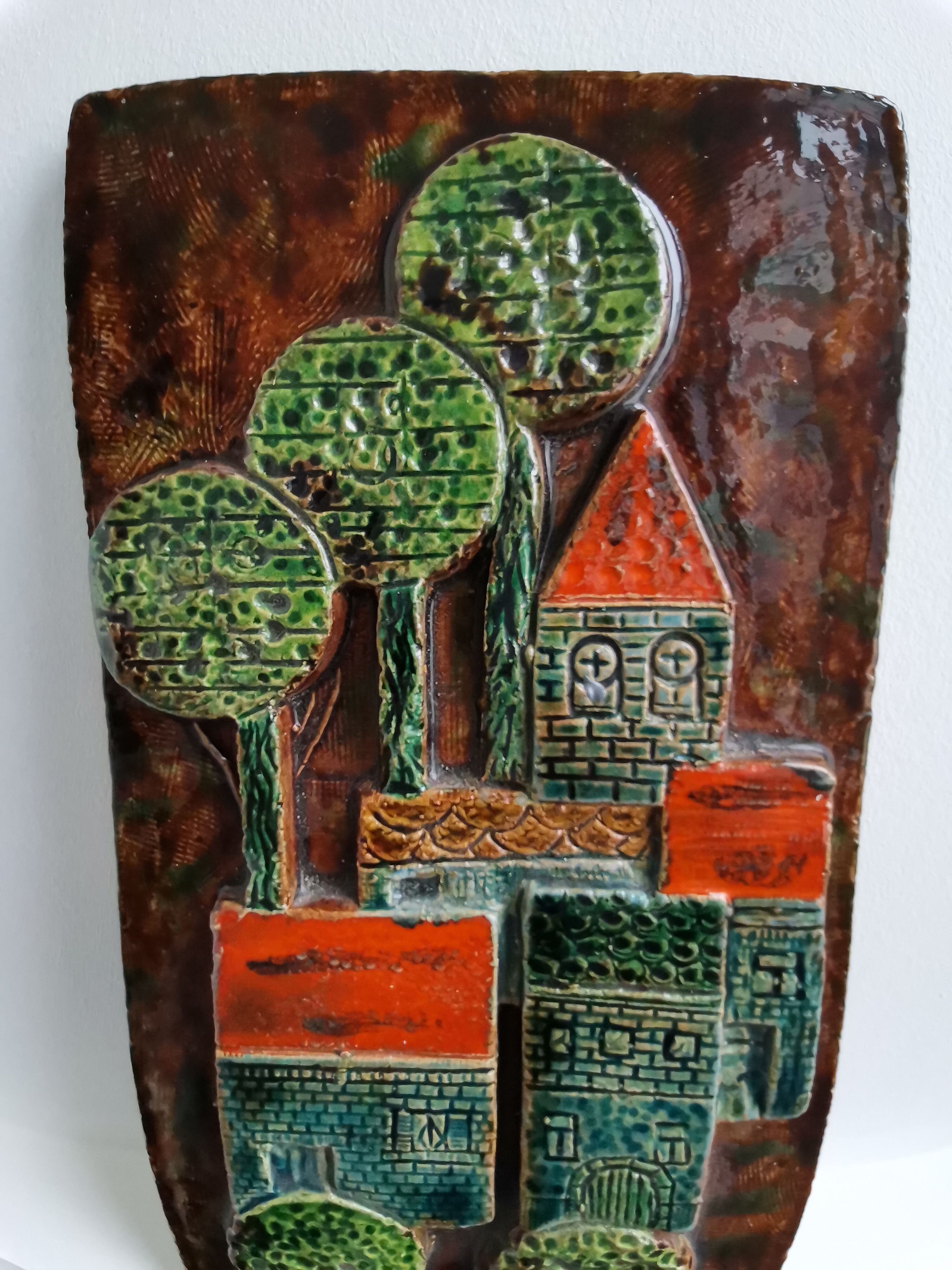 Decorative enamelled wall plate signed