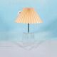 Minimalist glass table lamp from the 80s with a pleated shade.