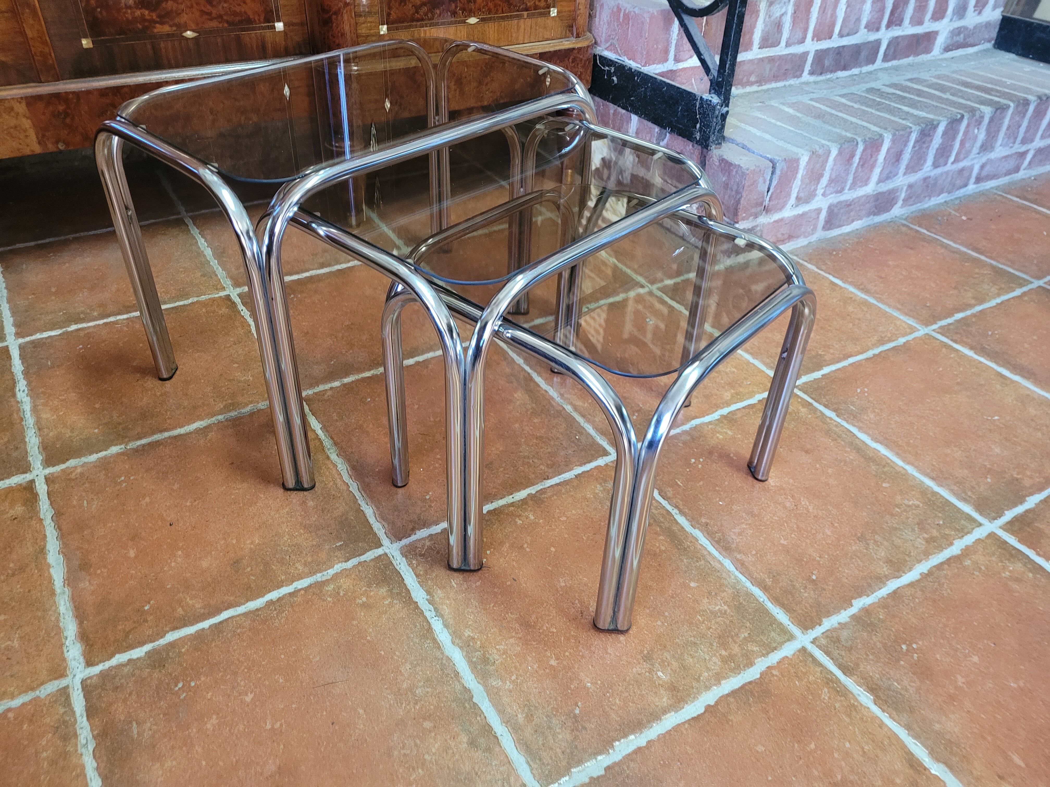 Chrome nesting table with smoked glass top from the 70s