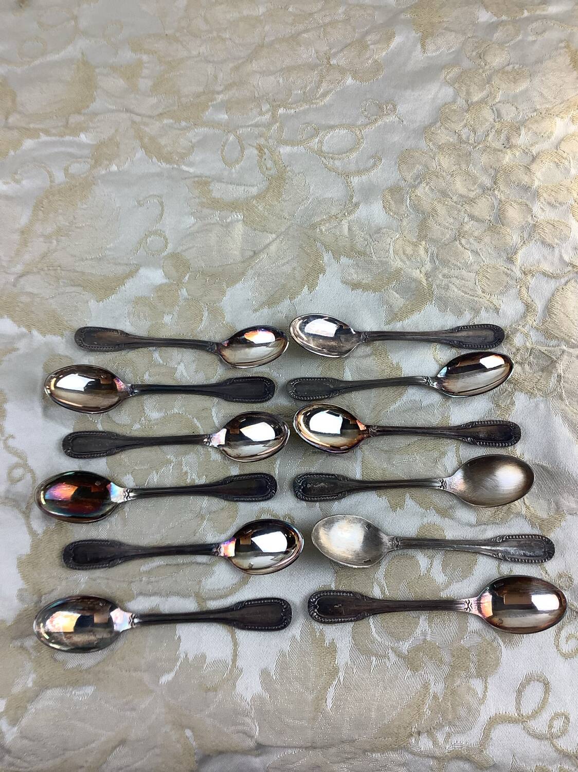 Box of 12 old spoons