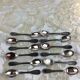 Box of 12 old spoons