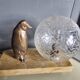 Lampe, veilleuse d'époque Art déco pingouin et globe en verre craquelé