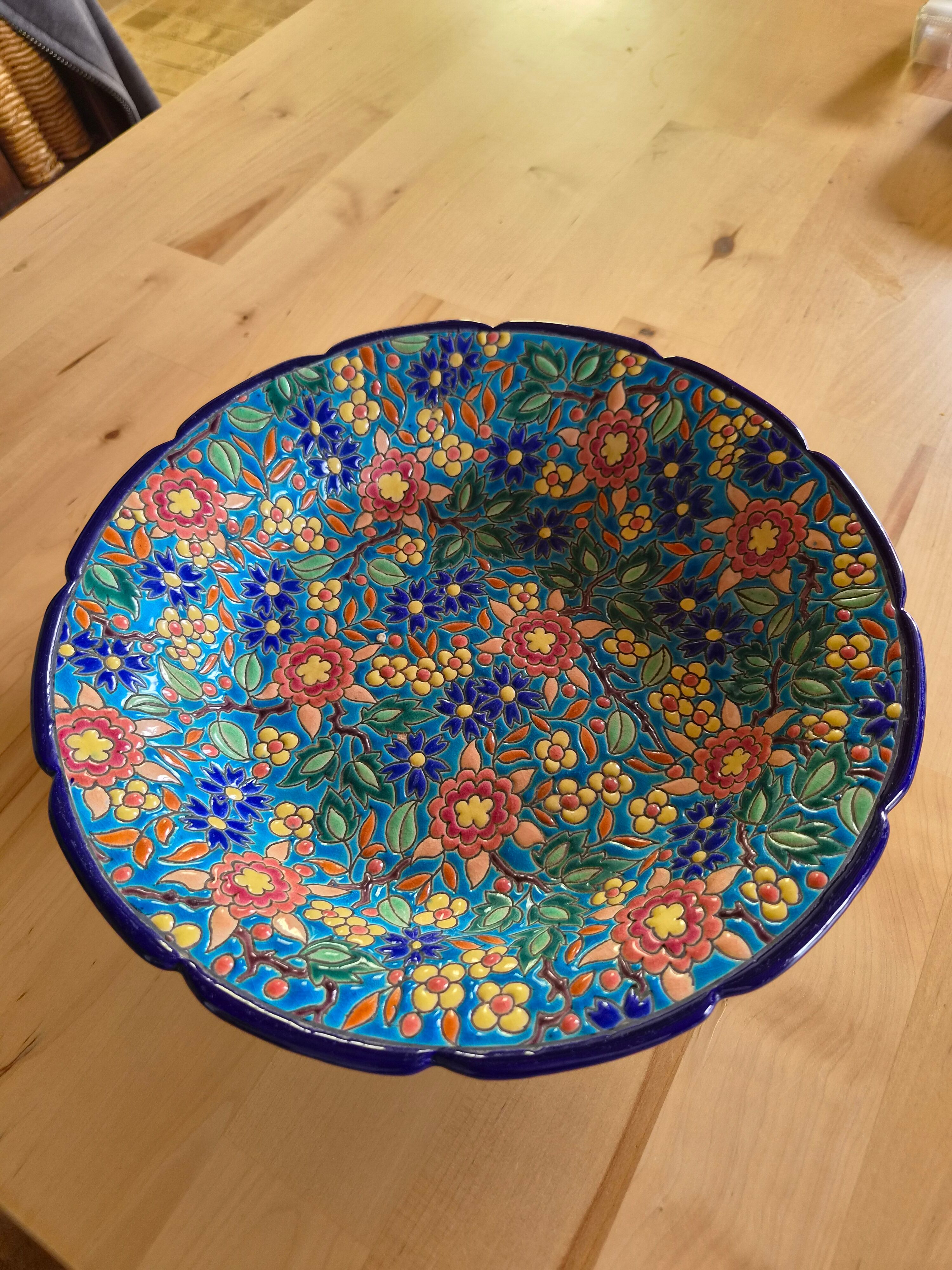 Plate in Émaux de Longwy with no cracks or chips.