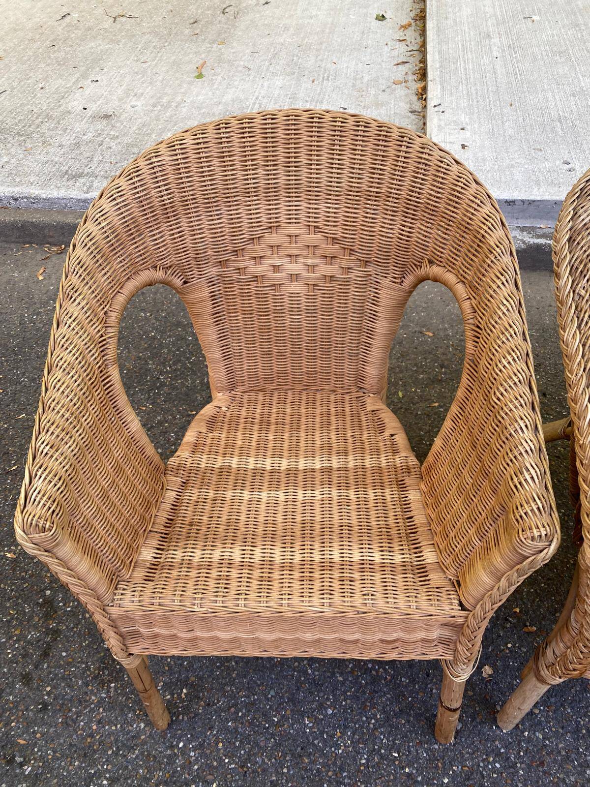 Rattan and woven wicker armchair in vintage bohemian style
