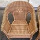 Rattan and woven wicker armchair in vintage bohemian style