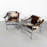 Pair of LC1 cow skin chairs by Le Corbusier for Cassina 1970